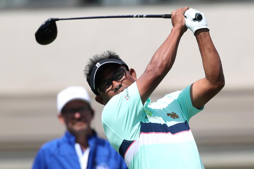 Tournament leader Thongchai Jaidee hits a long driver on 15-hole on day one of the Hoag Classic at the Newport Beach Country Club on Friday.
