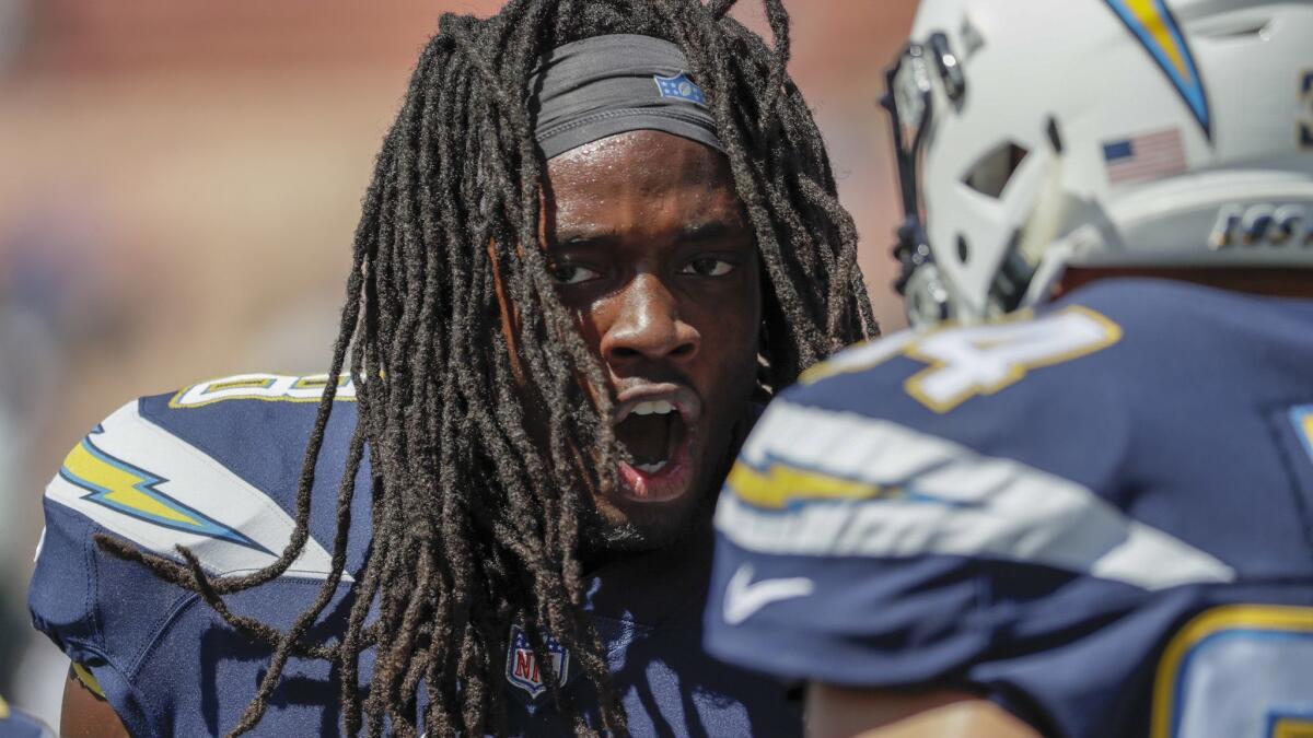 Chargers running back Melvin Gordon delivers a pregame pep talk to fellow running backs.