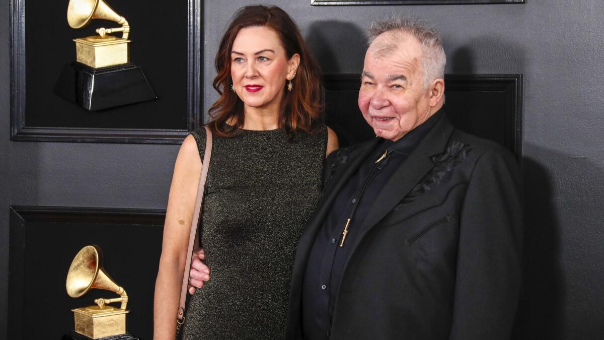 Fiona Whelan Prine and John Prine arriving for the 61st Grammy Awards in January in Los Angeles.