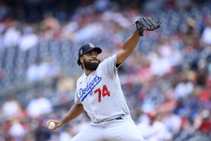 Los Angeles Dodgers relief pitcher Kenley Jansen (74) delivers a pitch during a baseball game against the Washington Nationals, Sunday, July 4, 2021, in Washington. The Dodgers won 5-1. (AP Photo/Nick Wass)