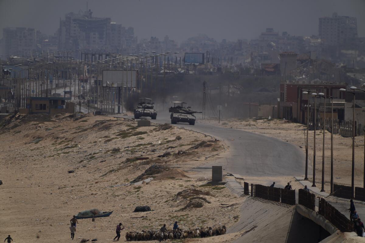 Israeli army tanks are seen in the central Gaza Strip