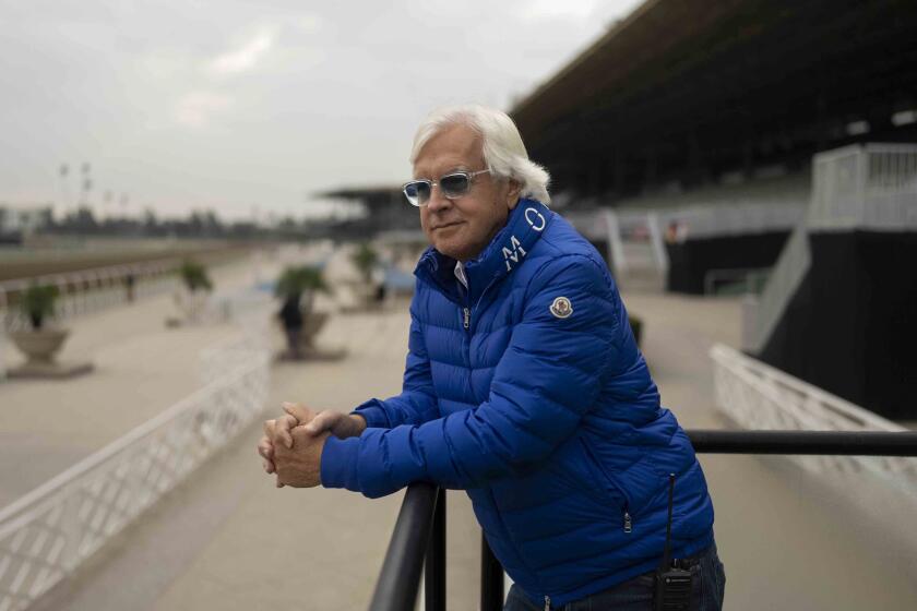 FILE - Trainer Bob Baffert stands for a photo ahead of the Breeders' Cup horse races at Santa Anita in Arcadia, Calif., Oct. 27, 2023. A Kentucky appeals court judge has denied Zedan Racing Stables’ requests for an emergency hearing and ruling that sought to allow Bob Baffert-trained Arkansas Derby winner Muth to run in next week’s Kentucky Derby at Churchill Downs. Kentucky Court of Appeals Judge Jeff S. Taylor issued an order denying relief on Wednesday, April 24, 2024, saying Zedan’s motion failed to name the Hall of Fame trainer suspended by Churchill Downs as an “indispensable party” in its motion. (AP Photo/Jae C. Hong, File)