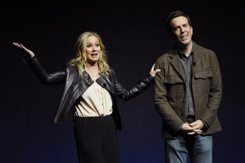 Christina Applegate and Ed Helms discuss their upcoming film "Vacation" during the Warner Bros. presentation at CinemaCon on Tuesday in Las Vegas.