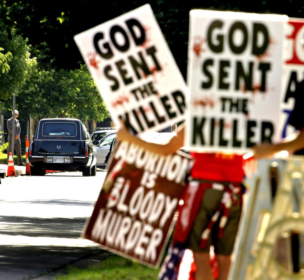 Westboro Baptist Church members protest at the funeral in Wichita, Kan., for George Tiller, a doctor who provided abortions, after he was killed by an antiabortion activist in 2009. In 2011, after the family of a slain soldier sued church leaders over a protest at a funeral, the Supreme Court ruled the action was protected by free-speech rights under the 1st Amendment.