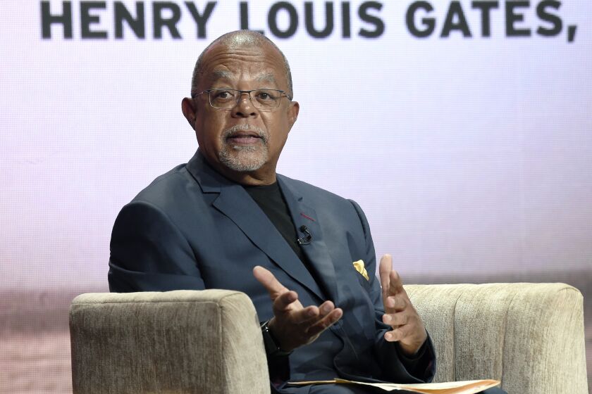 FILE - Dr. Henry Louis Gates Jr., host and executive producer of the PBS series "Finding Your Roots," takes part in a panel discussion during the 2019 Television Critics Association Summer Press Tour in Beverly Hills, Calif., on July 29, 2019. Gates Jr., details the social history of African Americans in a four-part PBS series, “Making Black America: Through the Grapevine.” (Photo by Chris Pizzello/Invision/AP, File)