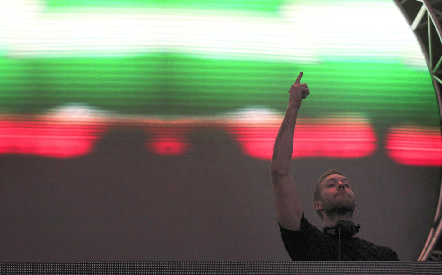 DJ Calvin Harris directs the crowd while onstage at KIIS-FM's annual Wango Tango concert at the StubHub Center in Carson.