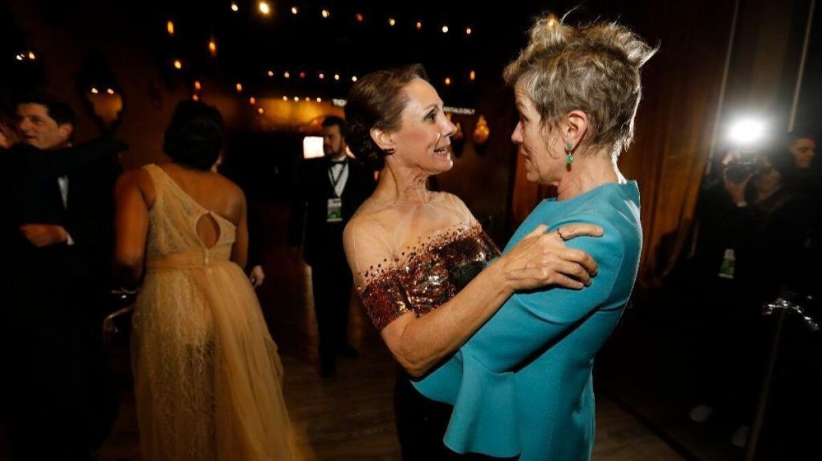 Laurie Metcalf and Frances McDormand backstage at the 24th Screen Actors Guild Awards.