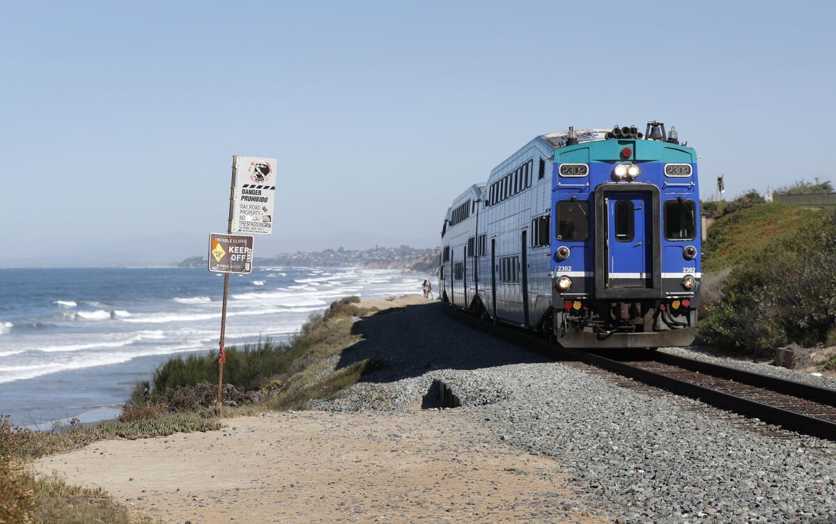 A Coaster train heads north along the bluffs in Del Mar in 2021