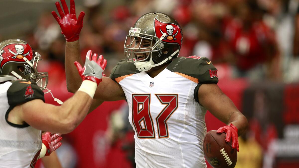 Tight end Austin-Seferian Jenkins celebrates after making a touchdown reception in the Buccaneers' win over the Falcons on Sept. 11.