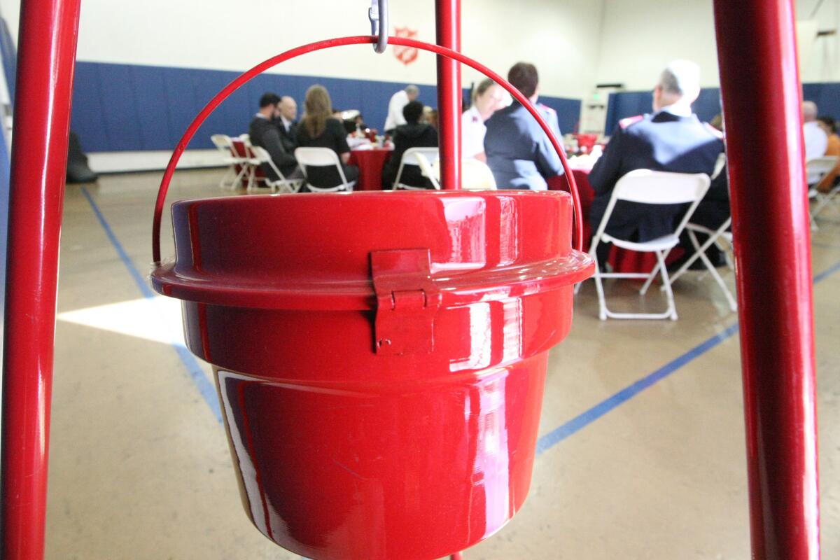 A red kettle hangs at the ready during the annual Red Kettle Kick-Off luncheon in Burbank on Thursday, November 5, 2015.