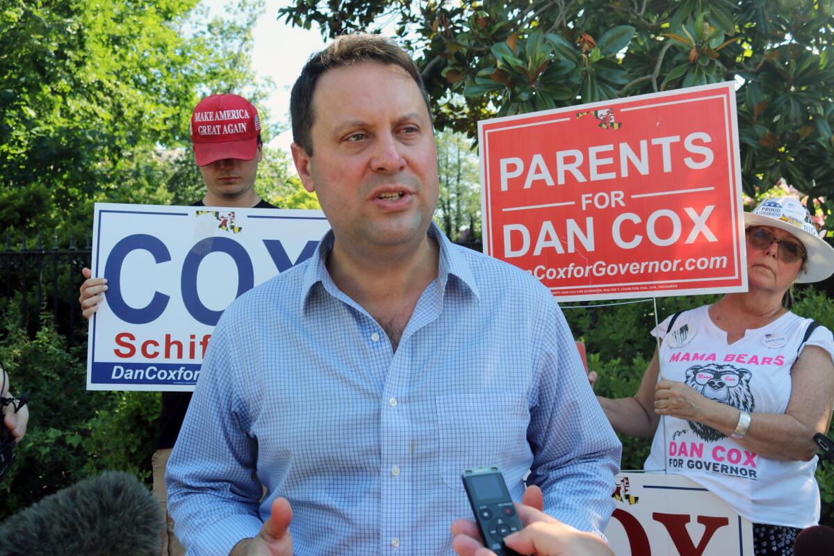 Del. Dan Cox talks to reporters outdoors in Annapolis, Md., on June 30, 2022.