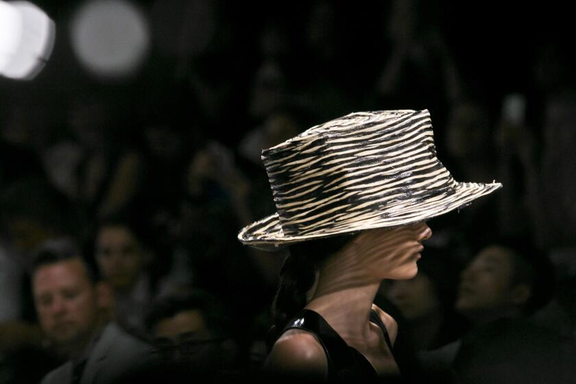 Large hats by Stephen Jones were prominently featured in Donna Karan's spring/summer 2015 collection during New York Fashion Week.