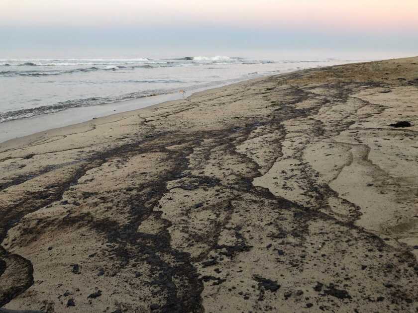Oil washed up on Huntington Beach.