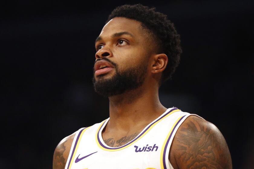 LOS ANGELES, CALIFORNIA - DECEMBER 01: Troy Daniels #30 of the Los Angeles Lakers looks on during a game against the Dallas Mavericks at Staples Center on December 01, 2019 in Los Angeles, California. NOTE TO USER: User expressly acknowledges and agrees that, by downloading and or using this photograph, User is consenting to the terms and conditions of the Getty Images License Agreement. (Photo by Katharine Lotze/Getty Images)