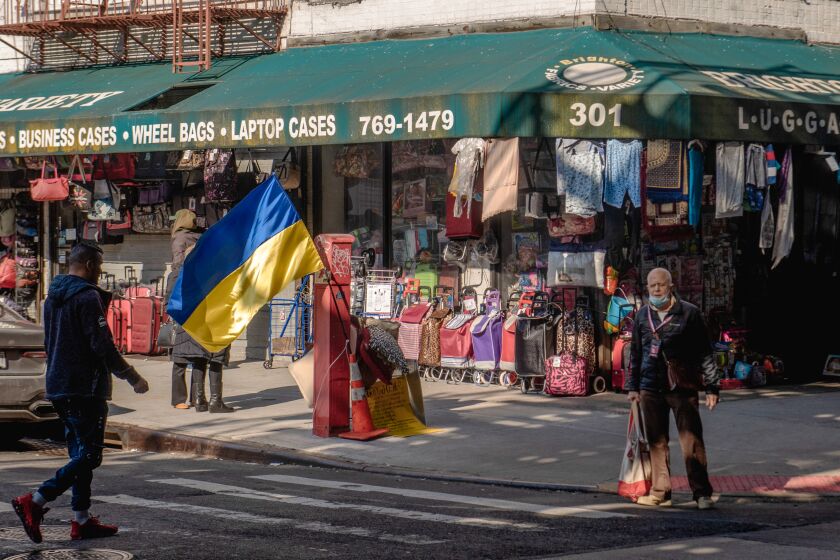 A Ukrainian flag hangs on the street corner in Brighton Beach, March 2022. 