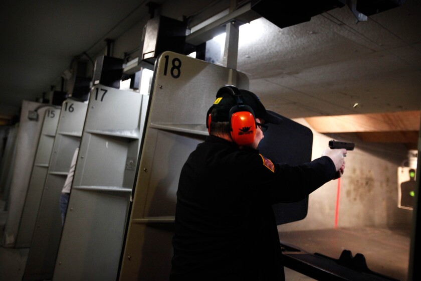 Tim Donnelly aimed a Glock 19 at a gun range last week. The weapon was borrowed from the range.