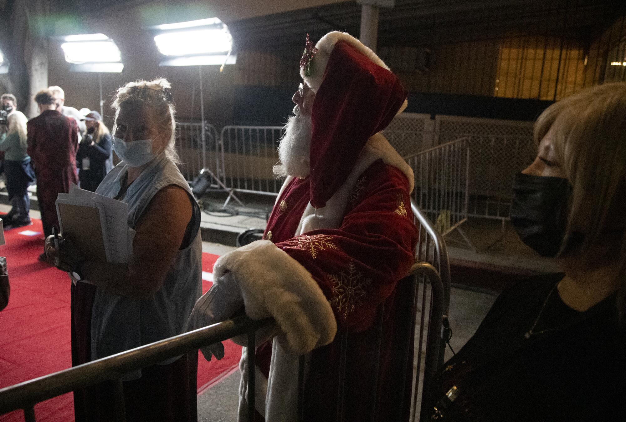 Santa Claus waits backstage