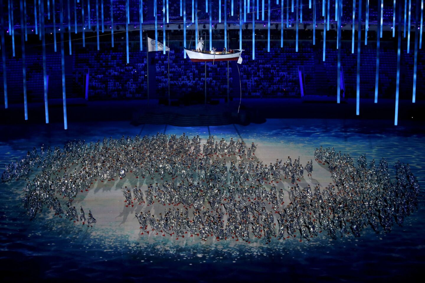 Dancers perform at the start of the 2014 Sochi Winter Olympics Closing Ceremony.