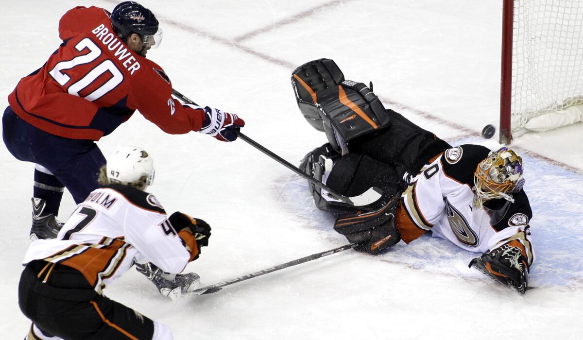 Ducks goalie Ilya Bryzgalov blocks a shot by Capitals right wing Troy Brouwer in the second period Friday.