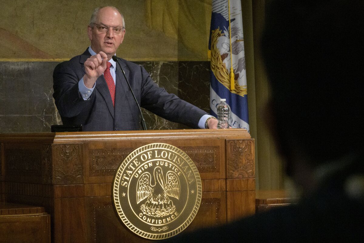 FILE - Louisiana Gov. John Bel Edwards speaks about the investigation into the death of Ronald Greene in Baton Rouge, La., Tuesday, Feb. 1, 2022. On Wednesday, June 1, 2022, Louisiana lawmakers are asking Bel Edwards and his top attorneys to testify before a bipartisan committee investigating allegations of a cover-up in the deadly 2019 arrest of Ronald Greene. (AP Photo/Matthew Hinton, File)