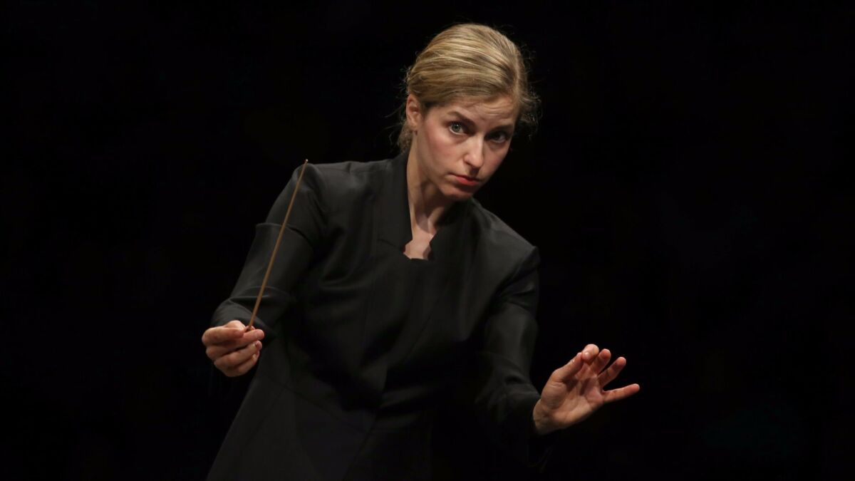 Karina Canellakis conducts the Los Angeles Philharmonic through a Mendelssohn program Tuesday at the Hollywood Bowl.