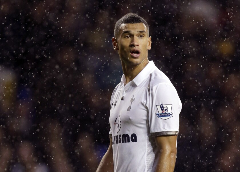 FILE - Tottenham Hotspur's Steven Caulker during the English Premier League soccer match against Queen's Park Rangers at Tottenham's White Hart Lane stadium in London, Sunday, Sept. 23, 2012. Former England defender Steven Caulker has switched eligibility to represent Sierra Leone, FIFA said Friday Dec. 17, 2021. Caulker, who has a grandparent from Sierra Leone, can now be selected for the African Cup of Nations. (AP Photo/Alastair Grant, File)
