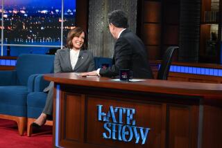 Vice President Kamala Harris and Stephen Colbert