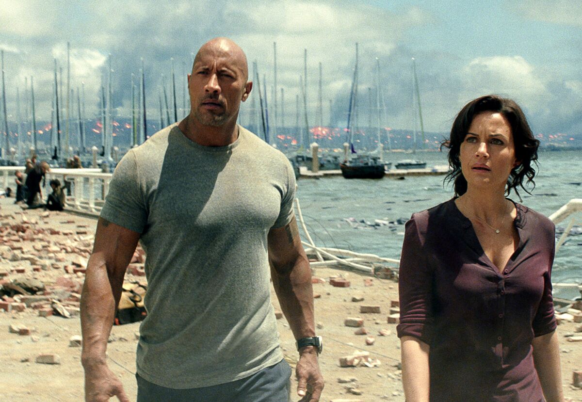 Dwayne Johnson and Carla Gugino in the movie "San Andreas."