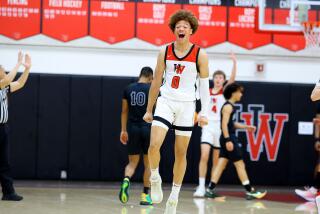 Junior guard Trent Perry of Harvard-Westlake unleashes a smile after making a three-point shot.