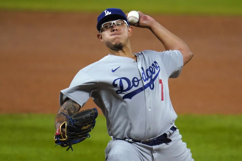 Los Angeles Dodgers starting pitcher Julio Urias works against the Colorado Rockies.
