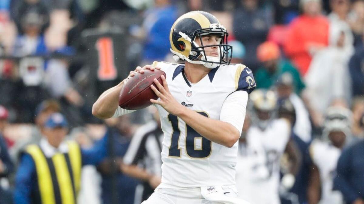 Rams quarterback Jared Goff looks to pass during a game against the Dolphins at the Coliseum on Nov. 20.
