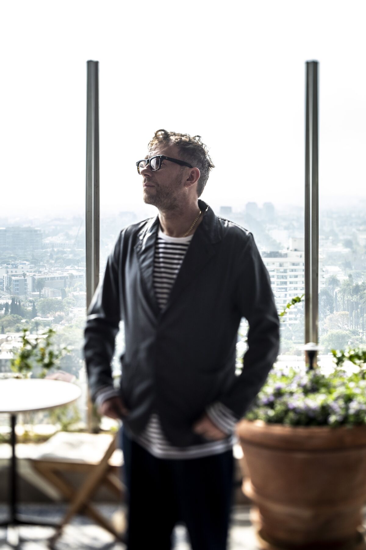 Damon Albarn, looking pensive at The Roof, at The West Hollywood EDITION.