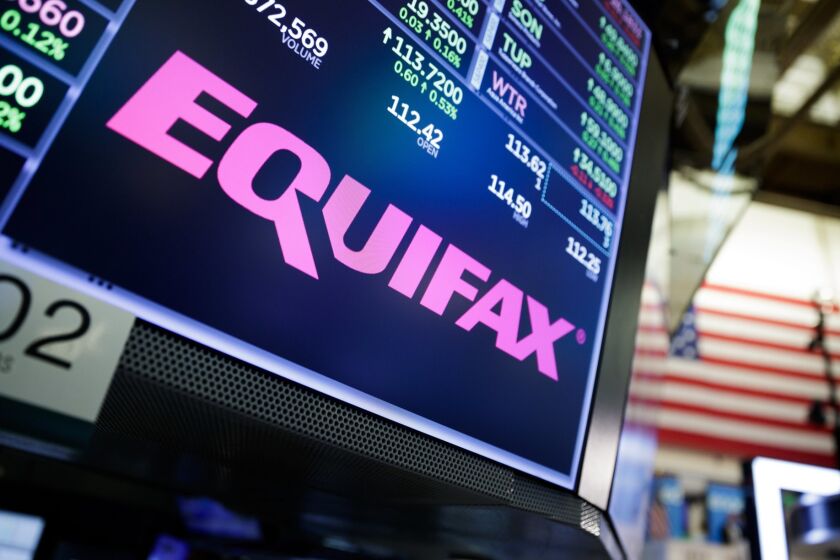 epa06200067 A view of a sign for the company Equifax on the floor of the New York Stock Exchange in New York, New York, USA, on 12 September 2017. The company recently disclosed that a data breach, discovered in July 2017, may have impacted as many as 143 million consumers in the United States. Equifax is one of the three main organizations in the US that calculates credit scores and has access to personal information including names, Social Security numbers, birth dates, addresses, some driver's license, and credit card numbers. EPA/JUSTIN LANE ** Usable by LA, CT and MoD ONLY **