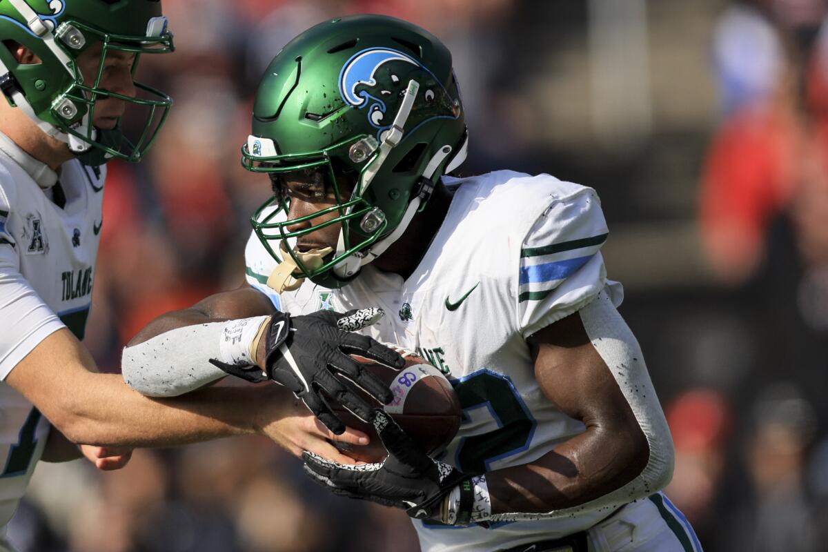 Tulane running back Tyjae Spears carries the ball against Cincinnati on Nov. 25.