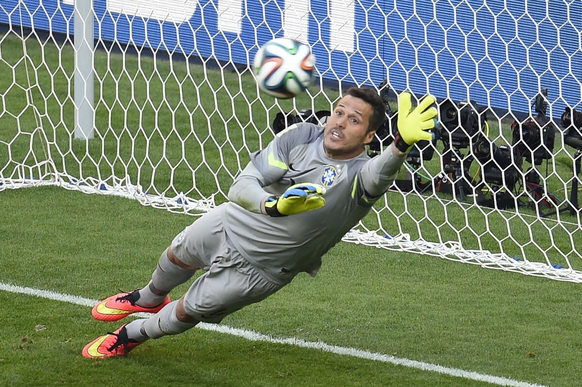 Brazil's goalkeeper Julio Cesar saves a shot during a shootout in the 2014 World Cup.