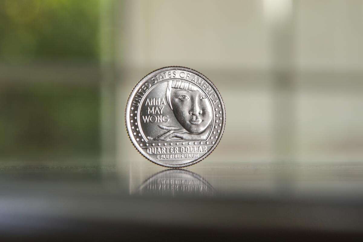 A quarter featuring a woman's face 