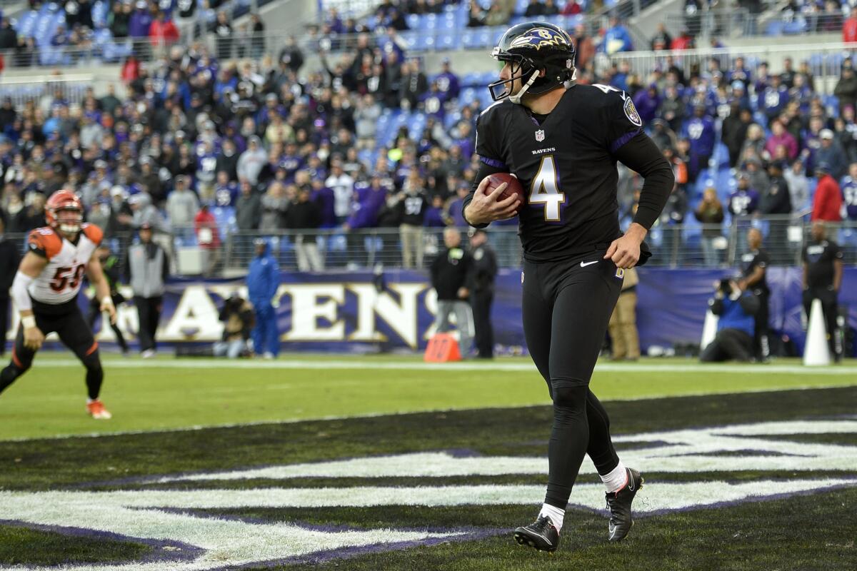 Baltimore punter Sam Koch stands in the end zone with the ball to end the Nov. 27 game against Cincinnati on a safety.