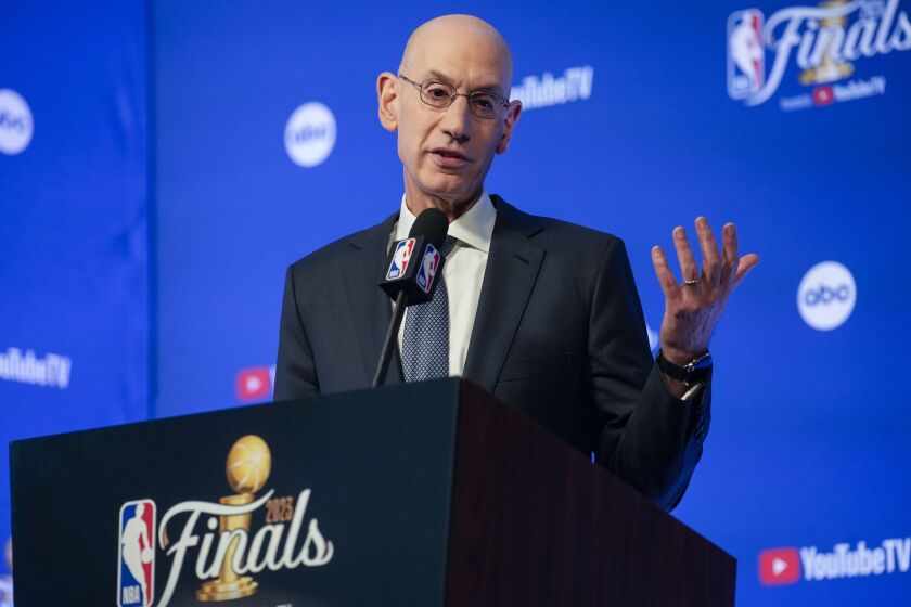 NBA Commissioner Adam Silver speaks to reporters before Game 1 of basketball's NBA Finals between the Denver Nuggets and the Miami Heat, Thursday, June 1, 2023, in Denver. (AP Photo/David Zalubowski)