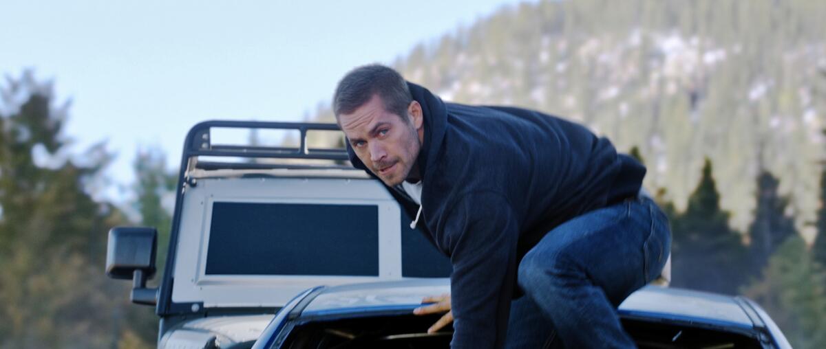 The late Paul Walker as Brian in the $1-billion-grossing Universal Pictures film "Furious 7."