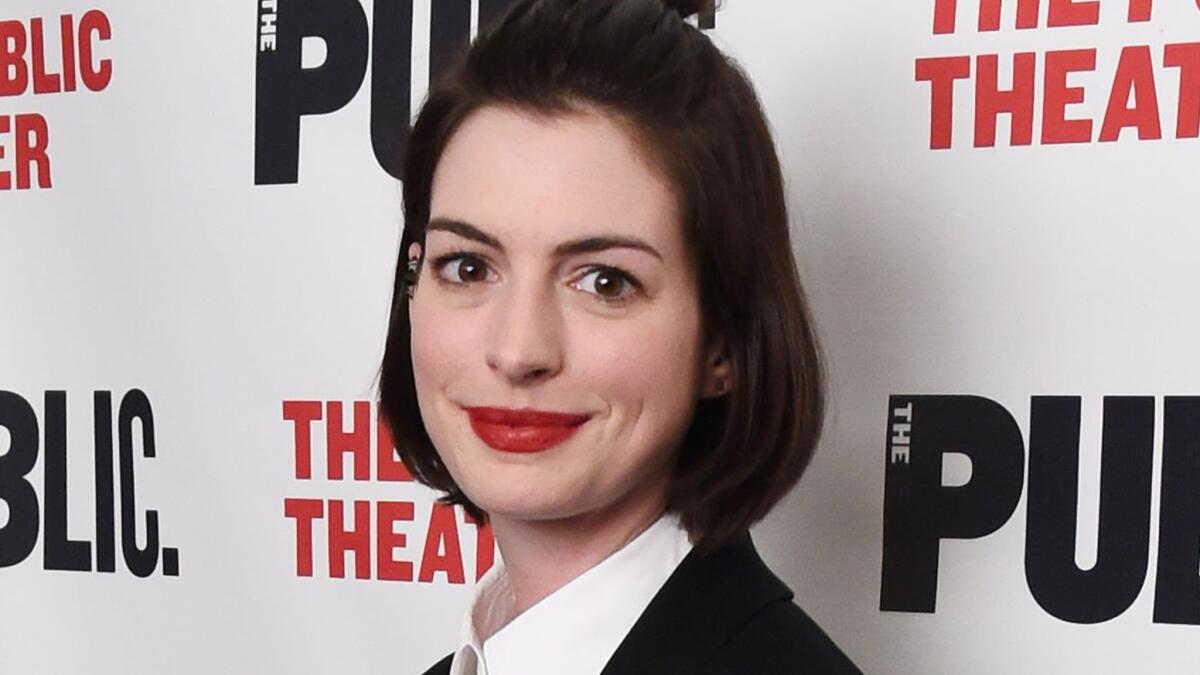Anne Hathaway has said in the past that she wants to be a mom -- but she's not adopting a child right now, despite reports saying she is.
