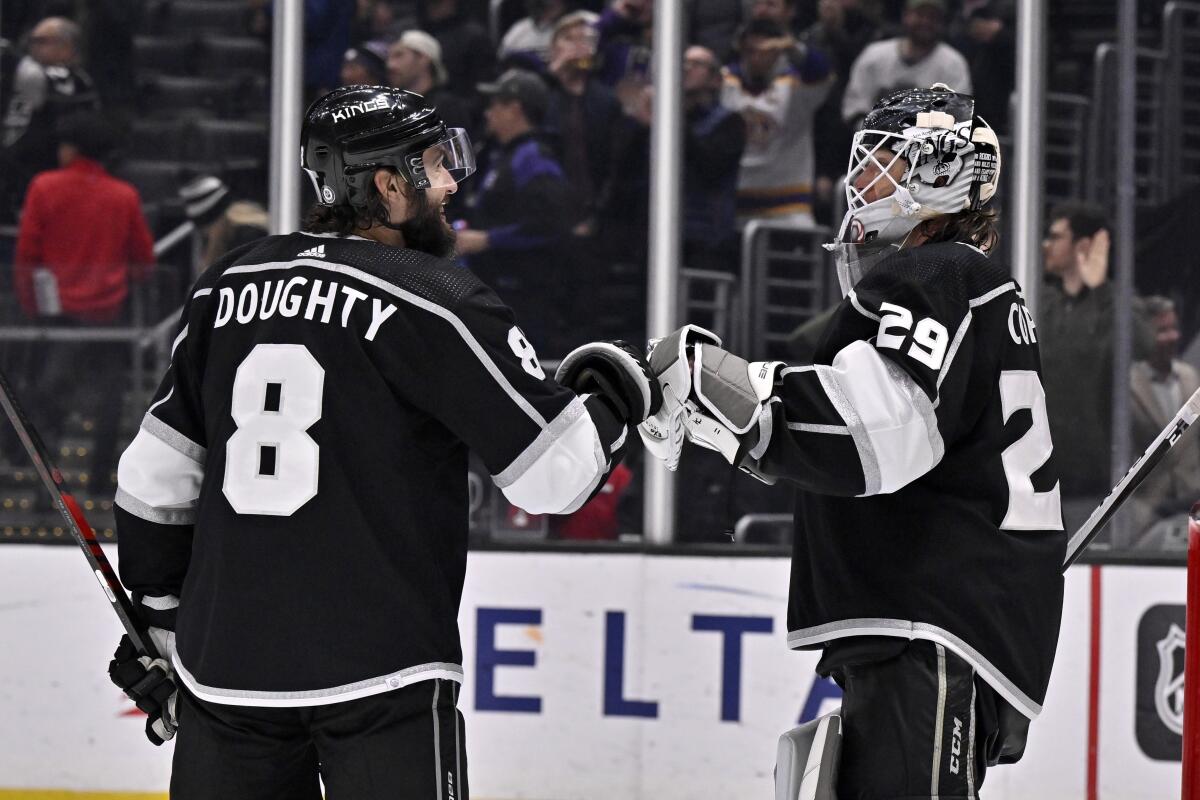 Kings defenseman Drew Doughty celebrates with goaltender Pheonix Copley after the Kings win.