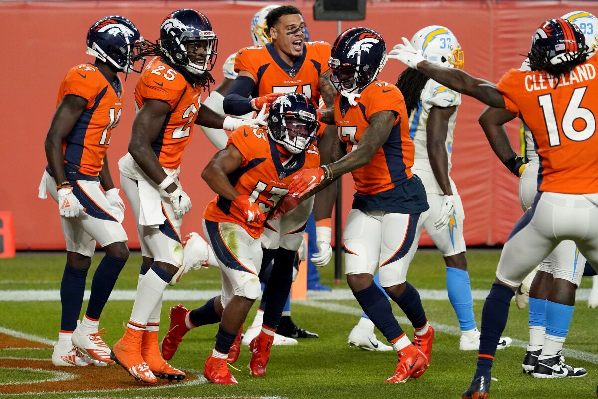 Broncos wide receiver KJ Hamler (13) celebrates his game-deciding touchdown catch on the last play against the Chargers.