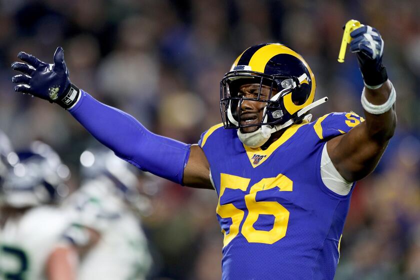 LOS ANGELES, CALIFORNIA - DECEMBER 08: Linebacker Dante Fowler #56 of the Los Angeles Rams gestures to the crowd during the game against the Seattle Seahawks at Los Angeles Memorial Coliseum on December 08, 2019 in Los Angeles, California. (Photo by Meg Oliphant/Getty Images)