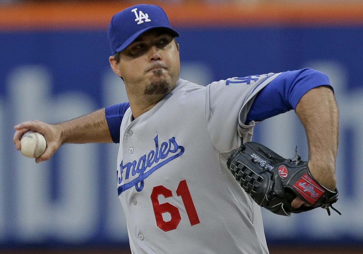 Josh Beckett got his second win of the season on the strength of a five inning outing in which he gave up four earned runs on eight hits while striking out six and walking two batters.