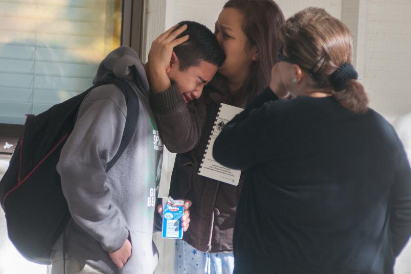 A Sparks Middle School student reacts after the shooting.