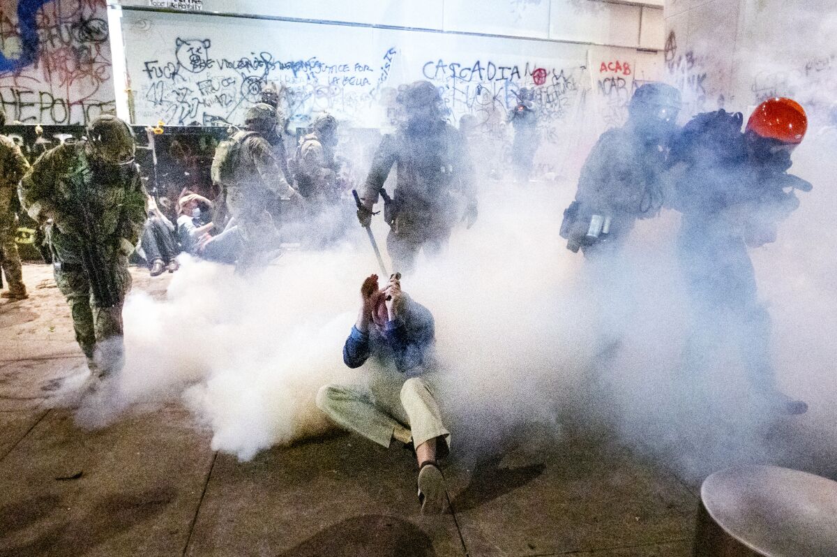 Federal agents clash with protesters in Portland, Ore.