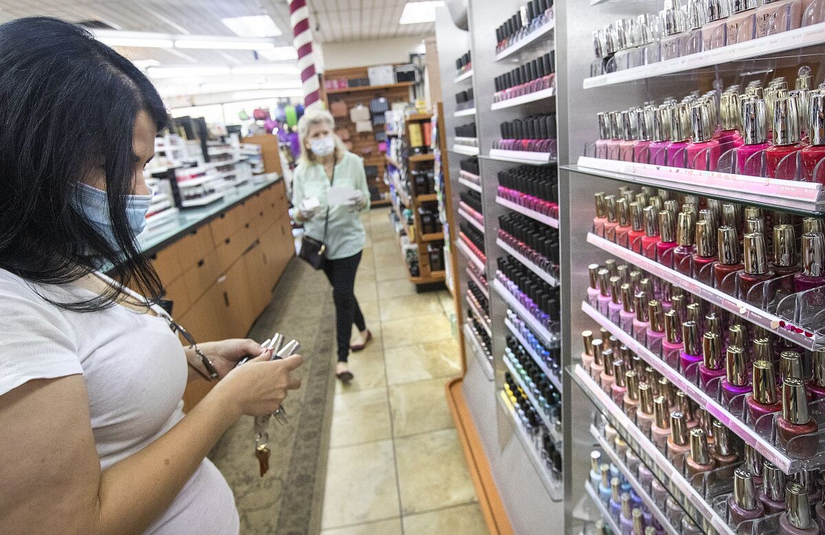 Jaqueline Argelagos shops for nail polish at Sherman Oaks Beauty Collection.