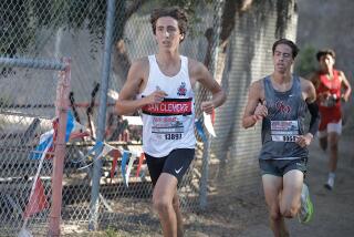 San Clemente's Brett Ephraim makes up ground in Mile 2 at the Mt. SAC Cross-Country Invitational in Walnut.