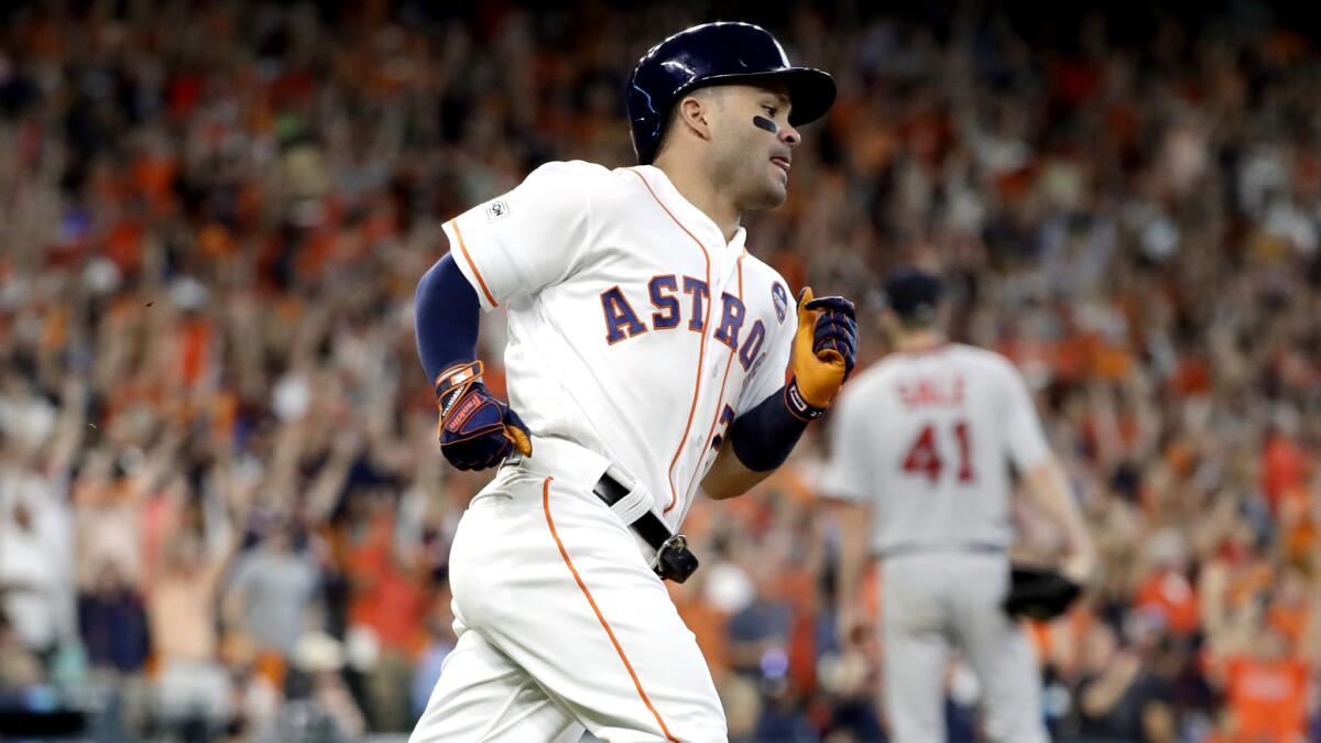 Astros second baseman Jose Altuve rounds first base after hitting a solo home run off Red Sox starter Chris Sale (41) during the fifth inning in Game 1 of the American League Division Series.