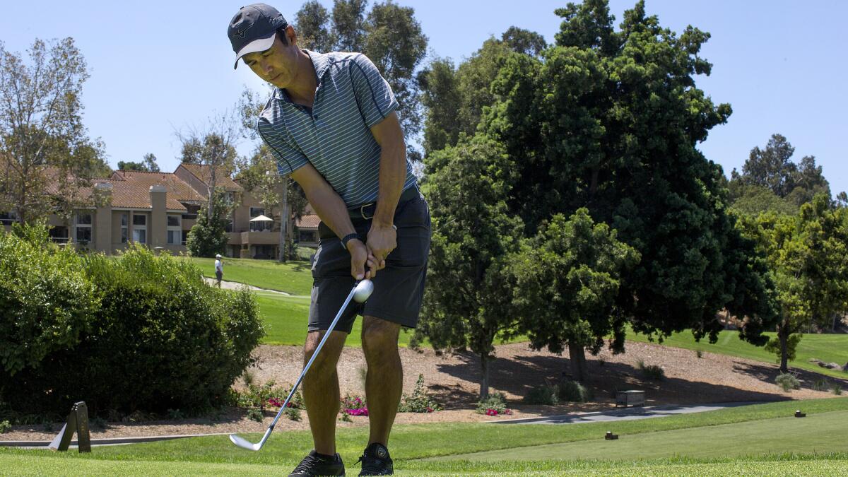 Shigetoshi Hasegawa works on his game at his home course of Mission Viejo Country Club.